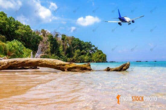 Passenger airline flies low over North Bay island at Andaman India