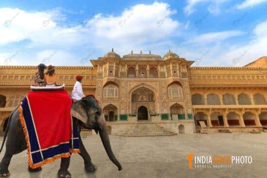 Tourist enjoy elephant ride at historic Amer Fort at Jaipur