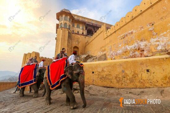Tourist enjoy elephant ride at Amber Fort Jaipur Rajasthan