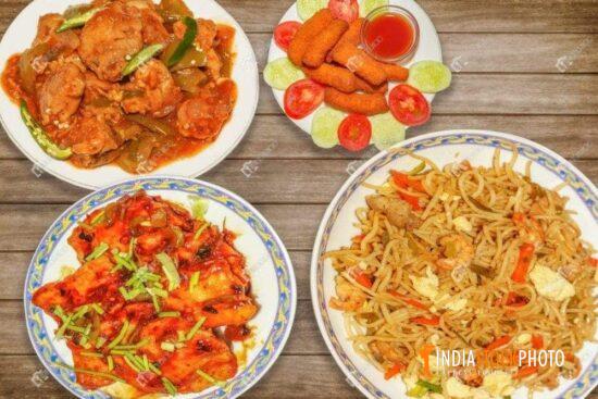 Indian food of spicy chicken chowmein with chilli chicken and red chilli fish