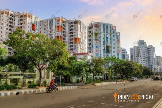 Residential apartments with city road at sunrise