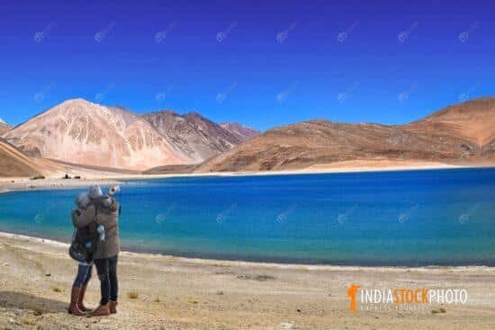 Couple clicking selfie at Pangong lake Ladakh