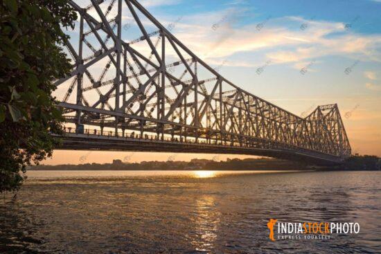 Howrah bridge Kolkata at sunrise on river Ganges