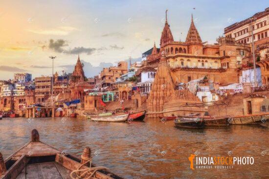 Historic Varanasi city architecture with Ganges riverbank at sunrise