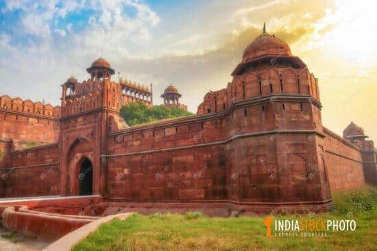 Historic Red Fort Delhi made of red sandstone at sunset