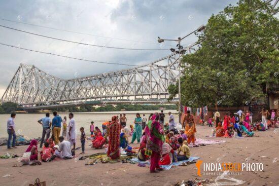 Pilgrims at Ganges riverbank near Howrah Bridge Kolkata