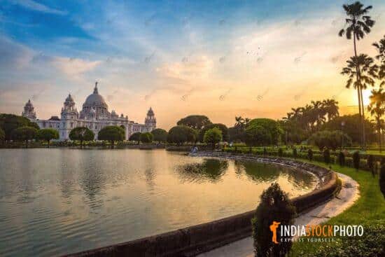 Victoria Memorial Kolkata with adjoining lake at sunset
