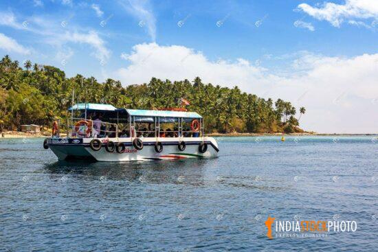 Tourist speed boat near North Bay island beach at Andaman