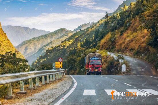Indian truck on scenic mountain road at Uttarakhand