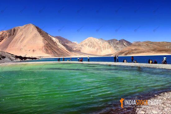 Scenic Pangong Lake Ladakh with tourists