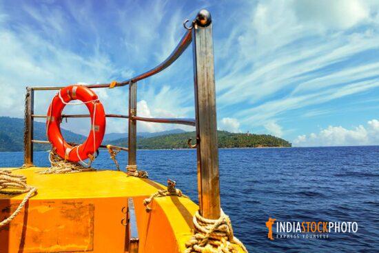 Life jacket on speed boat railing at Andaman sea