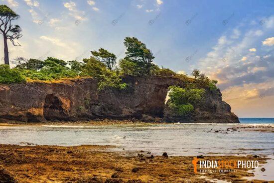 Neil island beach natural bridge rock formation at Andaman