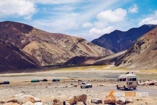 Tourist bus near Tso Moriri lake Ladakh with scenic landscape