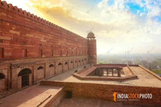 Fatehpur Sikri Agra medieval fort wall with cityscape at sunrise
