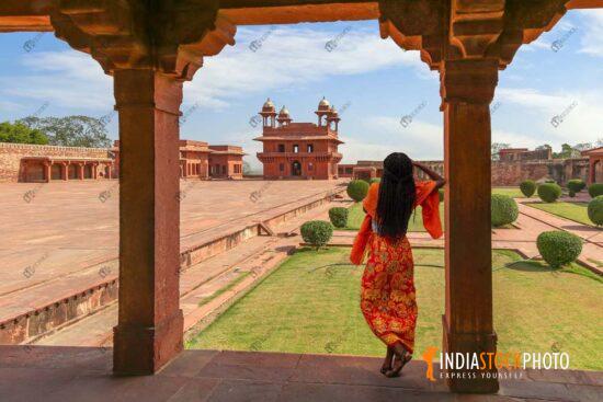 Female tourist at Fatehpur Sikri Agra medieval architecture