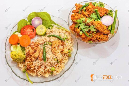 Indian veg fried rice with spicy chicken kosha