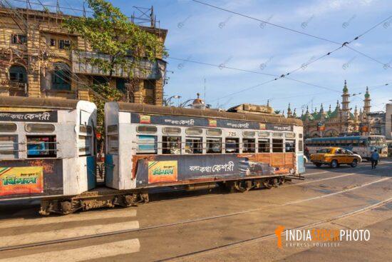 Kolkata tramways on city road with old heritage buildings at Esplanade