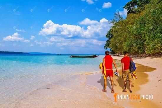 Male tourists at North Bay island sea beach at Andaman