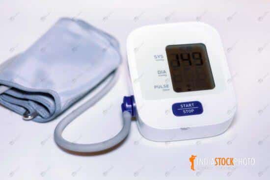 Portable blood pressure and pulse measuring instrument
