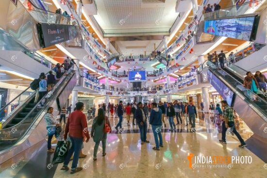 City shopping mall interior view with people