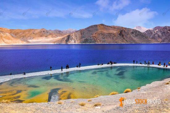 Scenic Pangong lake Ladakh India with view of tourists