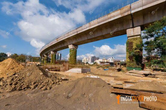 Under construction city bridge with building materials