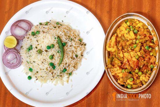 Veg peas fried rice with mixed vegetables side dish