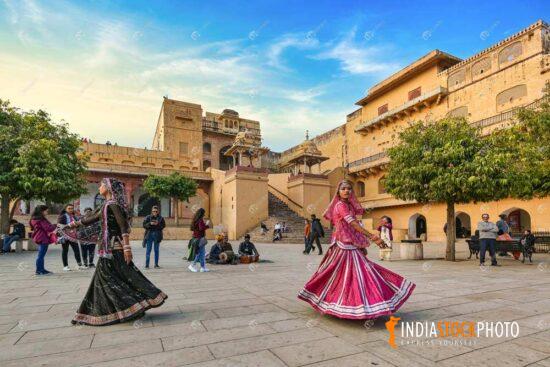 Rajasthani women perform dance at historic Amer Fort Jaipur