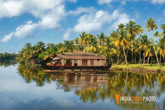 Scenic Kerala backwaters view with houseboat