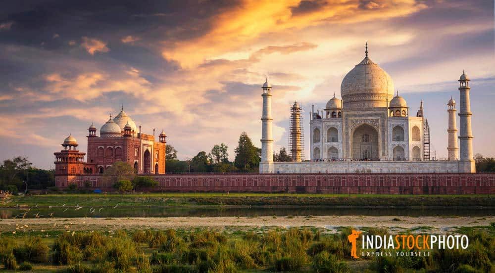 Taj Mahal Agra at sunset on the banks of river Yamuna