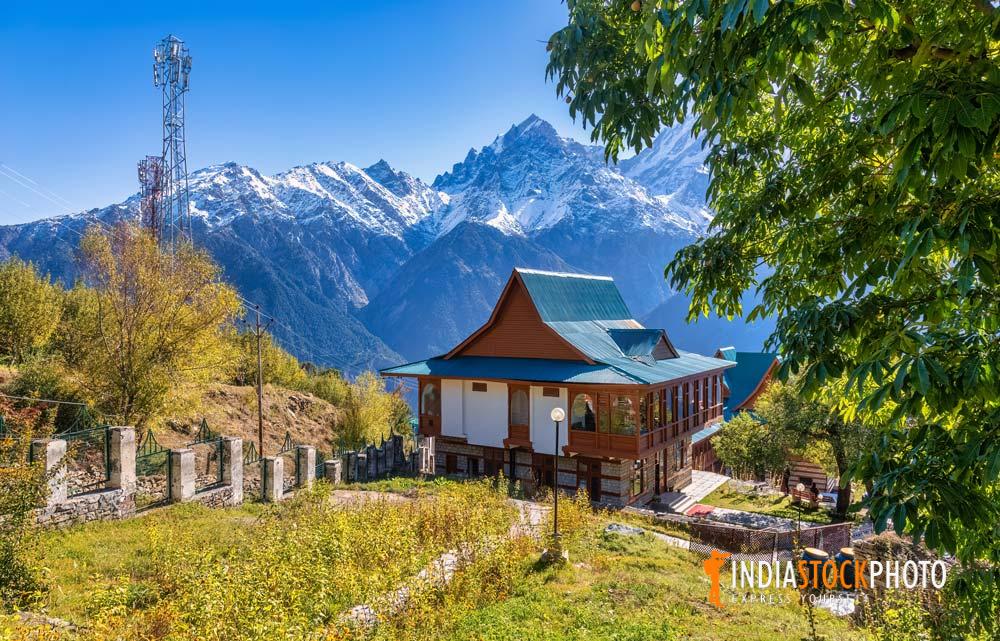 Wooden lodge with scenic Kinnaur Himalaya range at Kalpa Himachal Pradesh